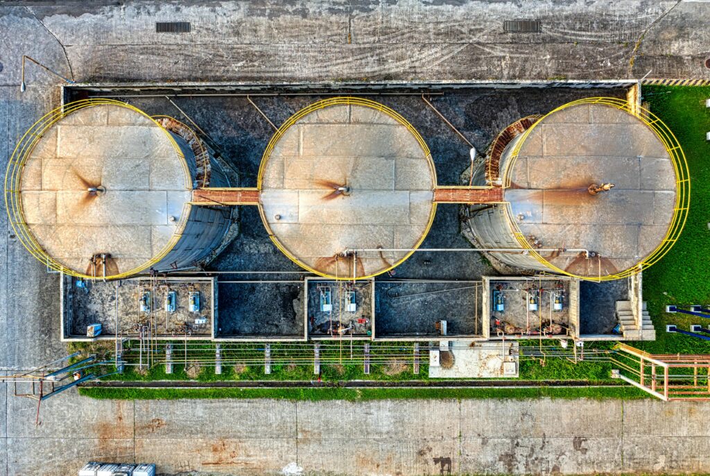 Round metal cylindrical containers at factory